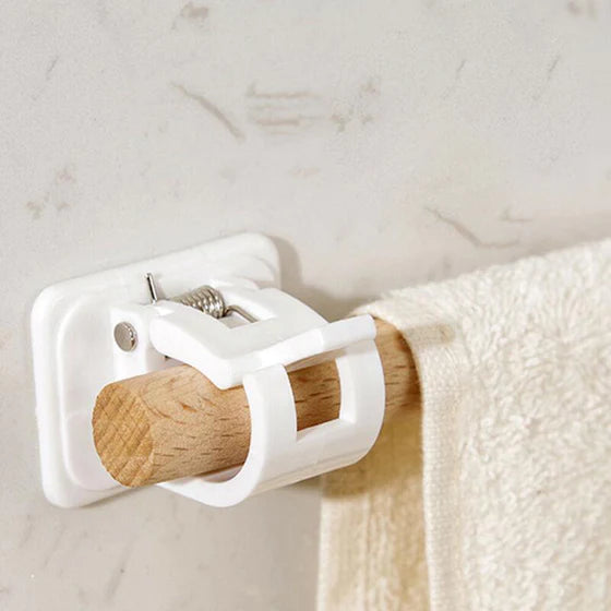 Självhäftande hållare för gardinstång